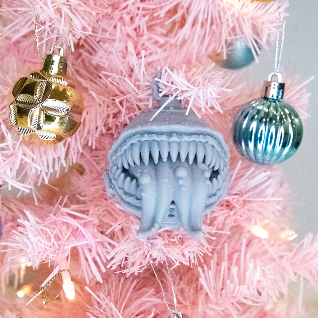 Resin Mimic Ornament with Open Mouth, Photograph, Front View.